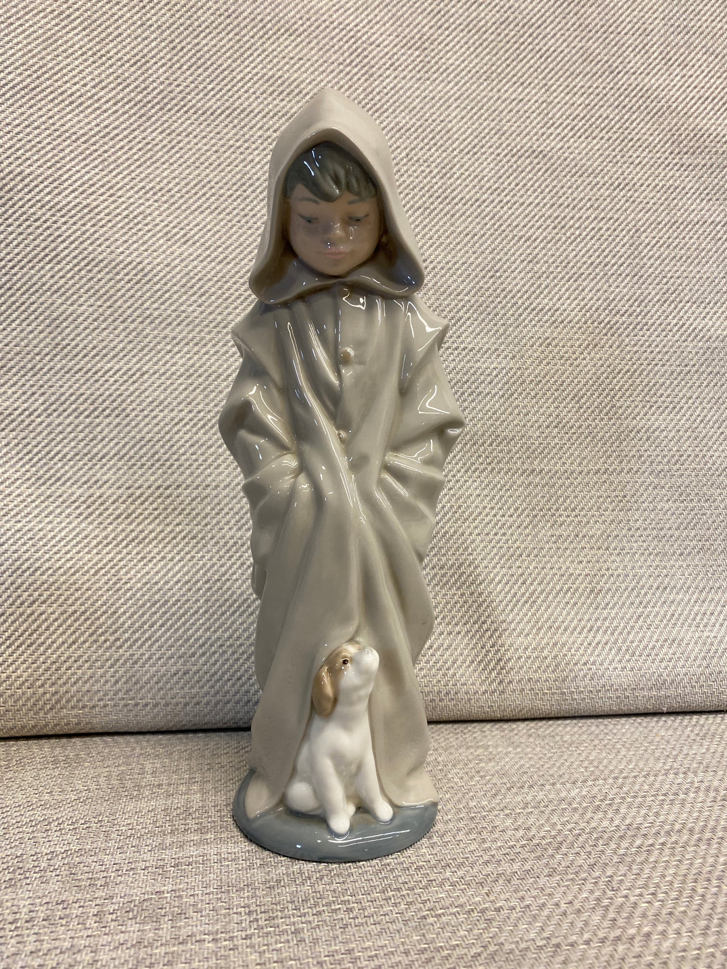 Nao Figurine - Boy In Raincoat