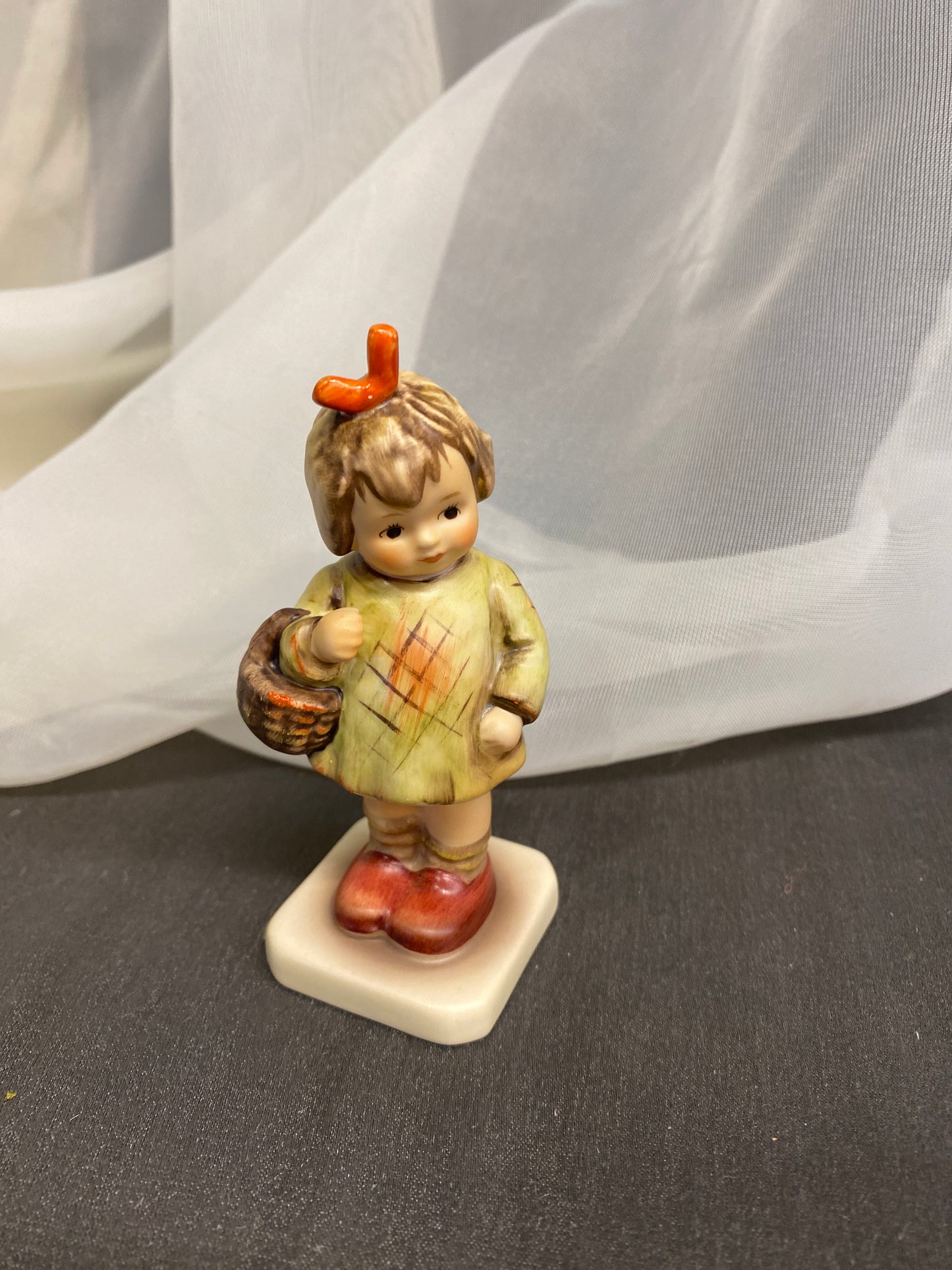 Hummel Figurine - I Bought You A Gift